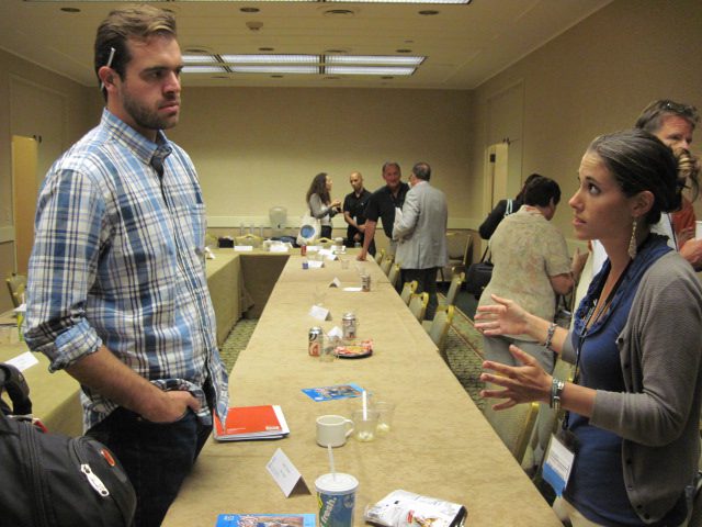 At the end of the workshop, Jen and Travis Riggs of Sea2Table, a sustainable seafood distributor linking fishers and chefs, discuss the possibilities for listing Belizean lionfish on his website. (Photo credit: Traditional Fisheries)
