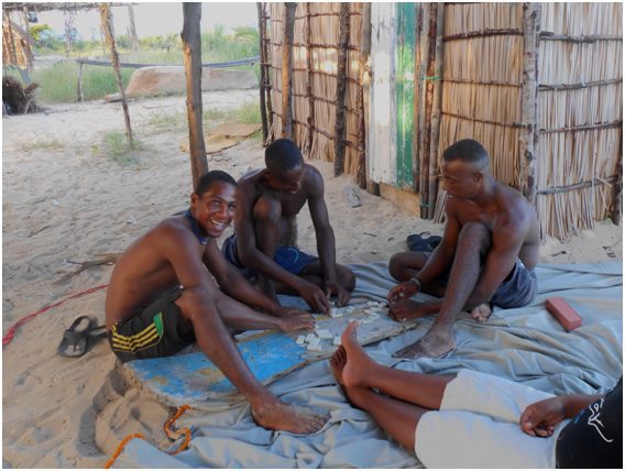 Playing dominos with some new friends on Nosy Maraontaly
