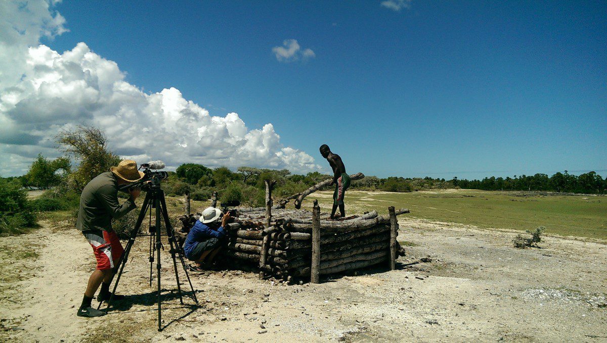 Filming the construction of a sokay (rudimentary quicklime, derived from the burning of molluscs and used for house construction in the region) kiln. Due to the large amount of timber required for sokay production, it is one of the key drivers of mangrove deforestation within the Bay.