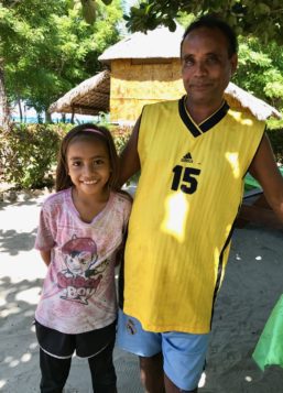 Homestay host Moses Alves with his daughter